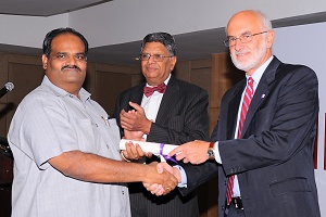 Dr. Hariprasad recieving the honorary FCEM from Dr. Ed Glucksman